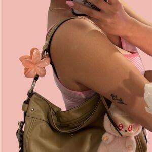 Stylish Tan Shoulder Bag with Floral Charm